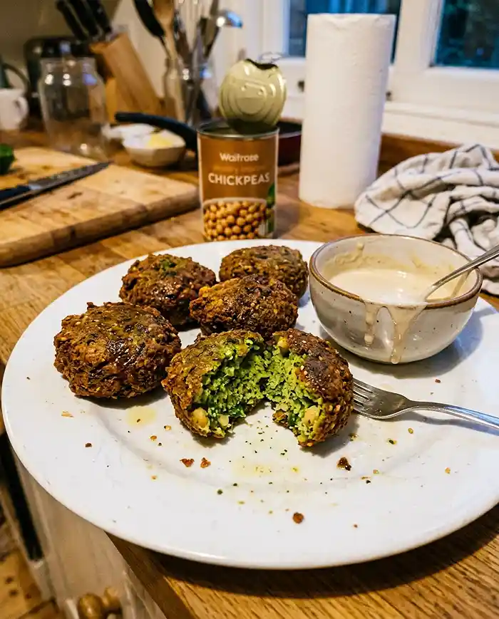 Crispy gluten-free falafel made with canned chickpeas served with tahini sauce