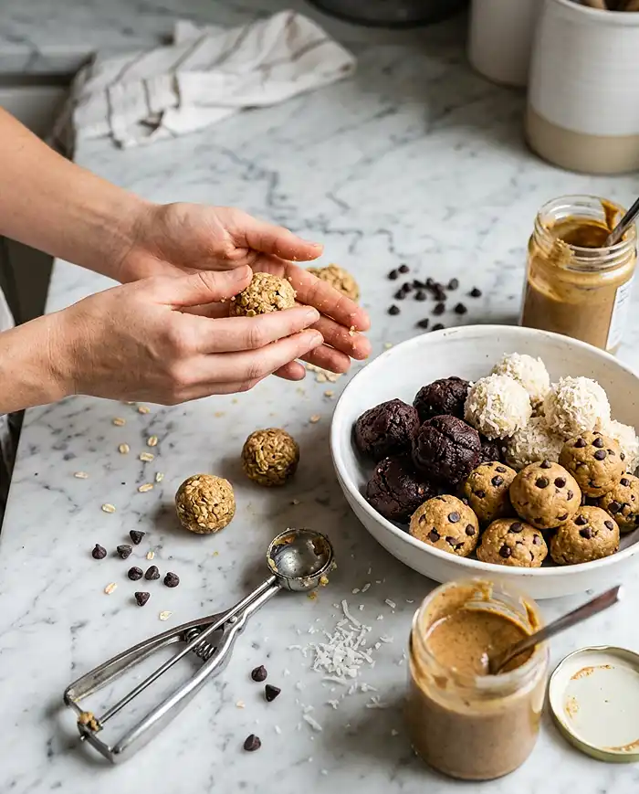 No Bake Gluten Free Snacks 5 Rolling no bake gluten free snacks into oatmeal cookie dough balls and energy bites